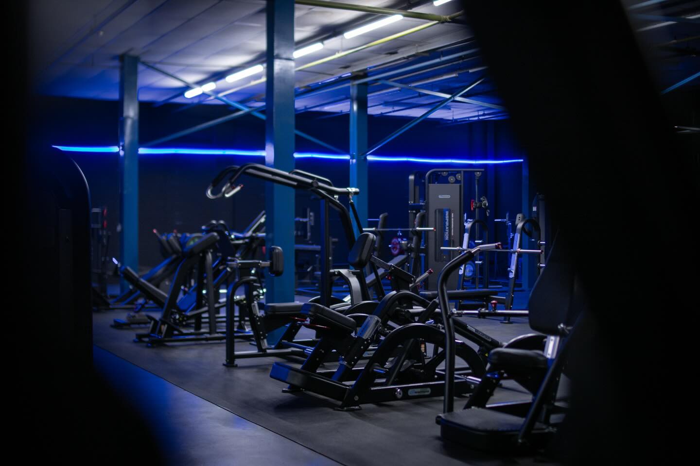 Dean coaching a client at IronHQ
